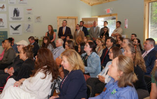 Attendees at the ribbon cutting ceremony