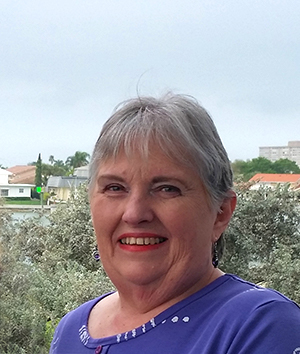 Outdoor photo of a smiling Dr. Susan S. Kilham