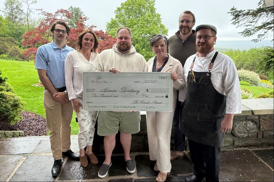 thefrenchmanor-2025-sponsor The French Manor presenting a large check to Lacawac Sanctuary